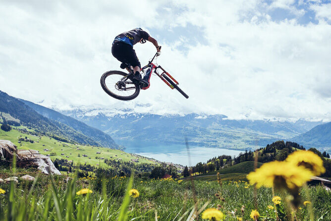 Sam Pilgrim doing a wheeling with his bike
