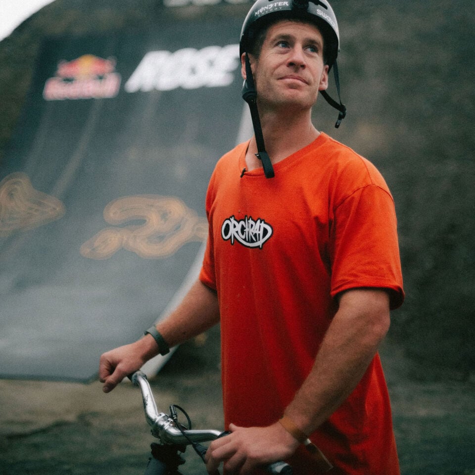  Proteam freeride MTB athlete Sam Pilgrim in orange shirt at Swatch Nines MTB event