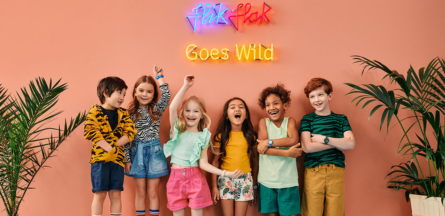 Happy kids wearing the watches from the collection Flik Flak Goes Wild