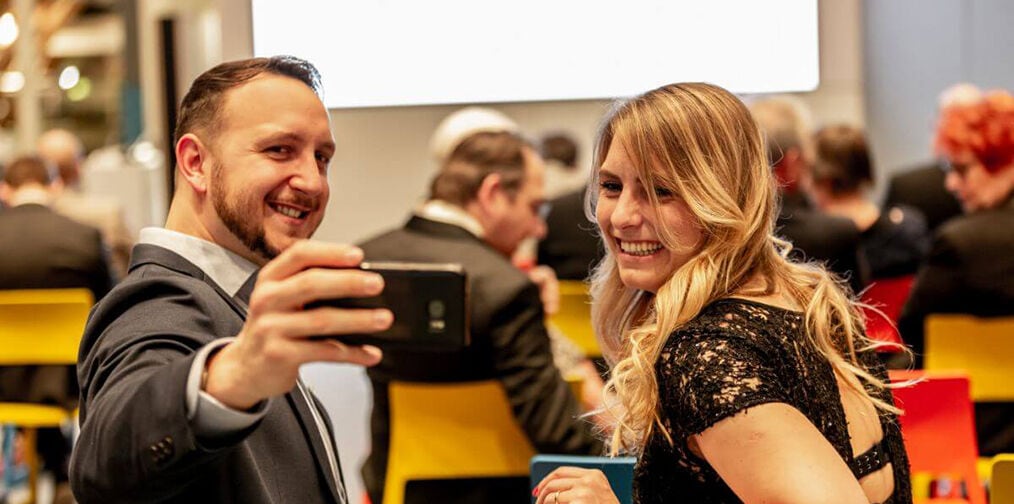 Couple smiling taking a selfi