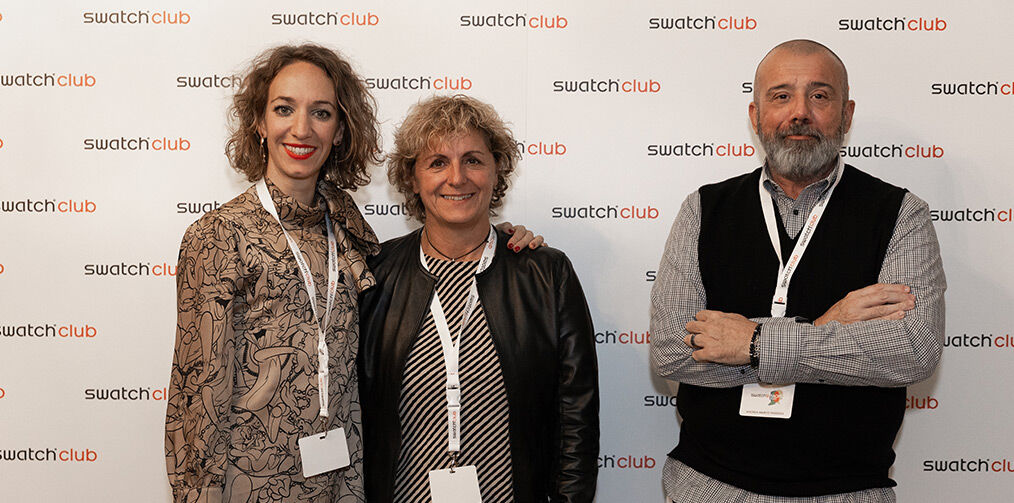 Club members in front of a wall where it is written 'Swatch Club' at La Biennale Arte 
