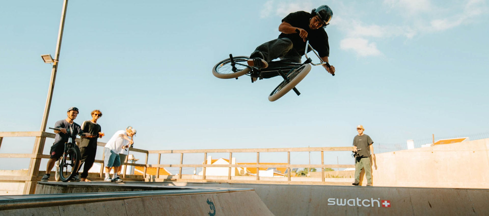 One of the athletes BMXing at the skatepark