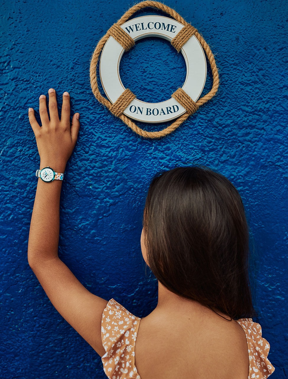 Kid wearing a watch from the collection Sea Treasure