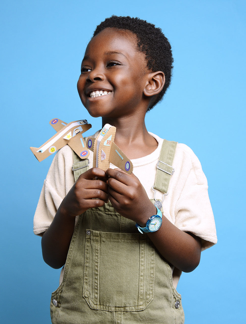 Boy wearing Flik Flak Blue Hippo watch for kids