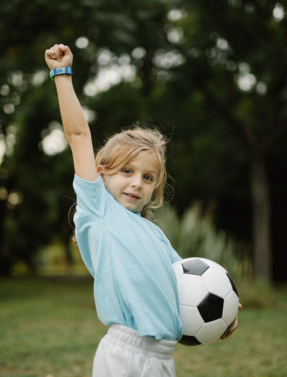 girl playing football