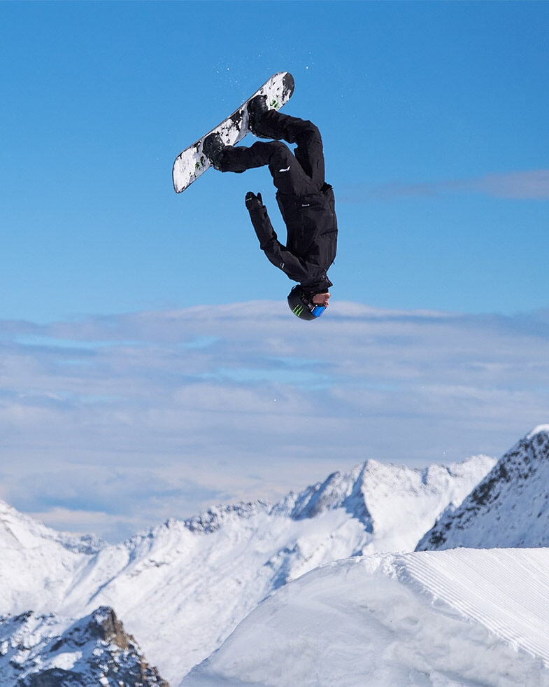 max parrot doing a snowboard figure