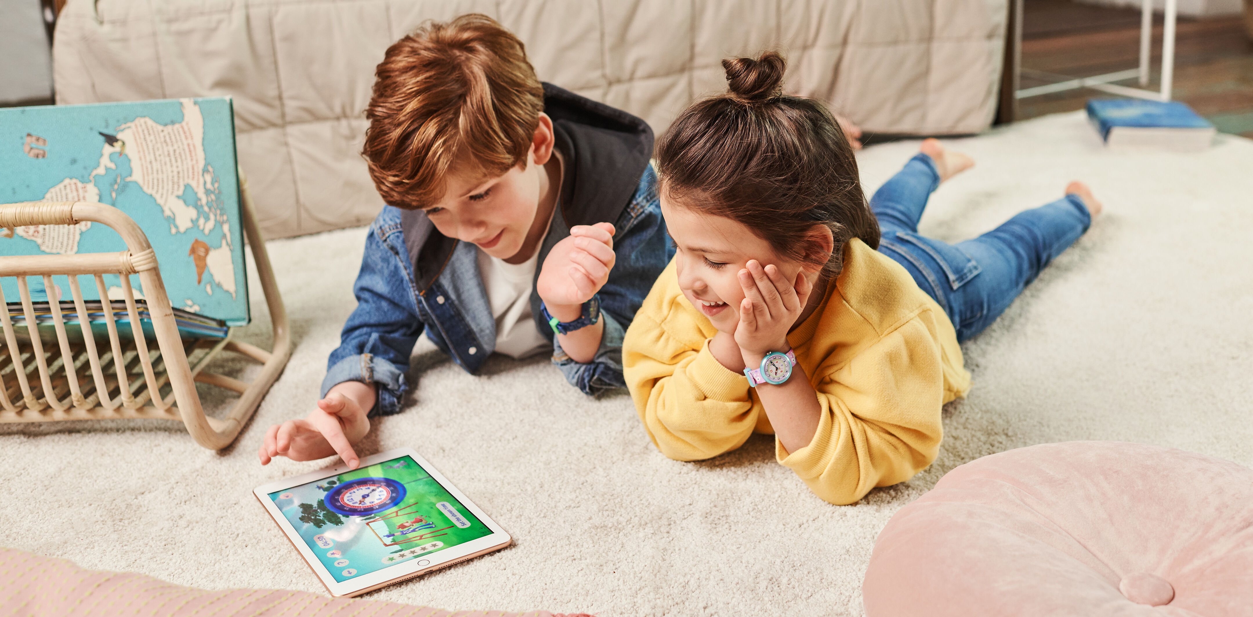 Kids playing educational games on their tablet