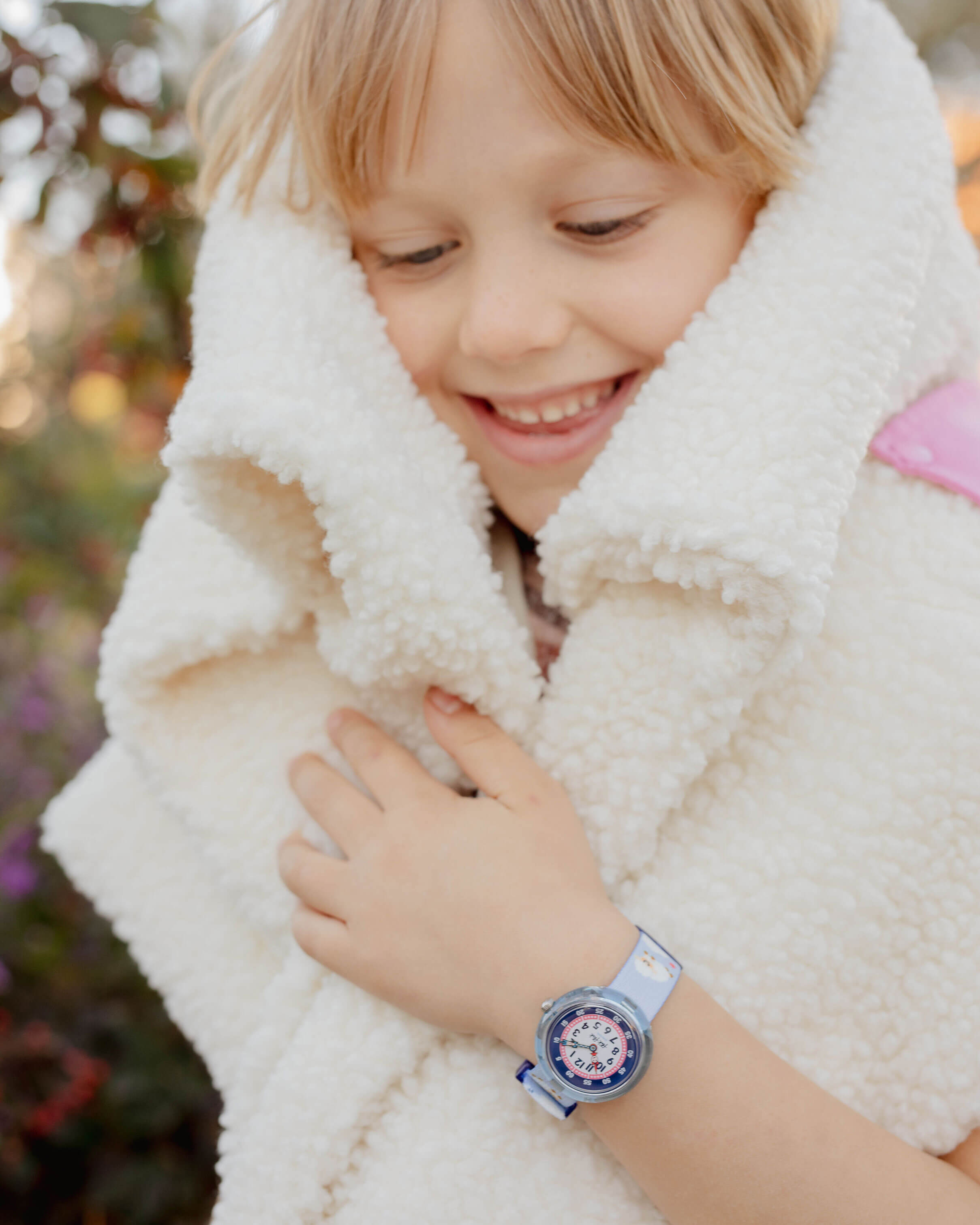 Kid wearing Flik Flak Watch
